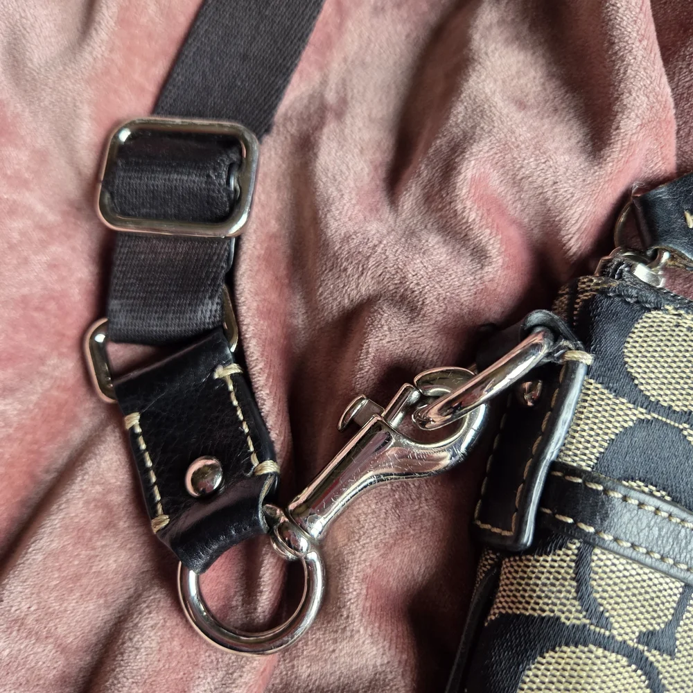 Authentic Coach Monogram Crossbody bag.